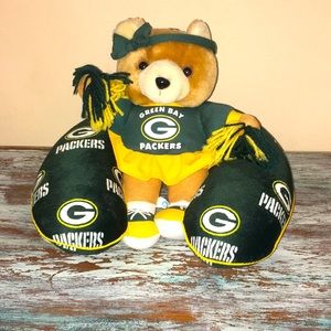 Green bay packer neck pillow and cheerleader teddy bear